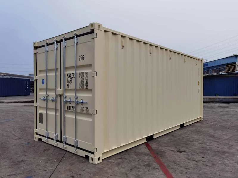 Beige 20-foot shipping container with closed cargo doors.